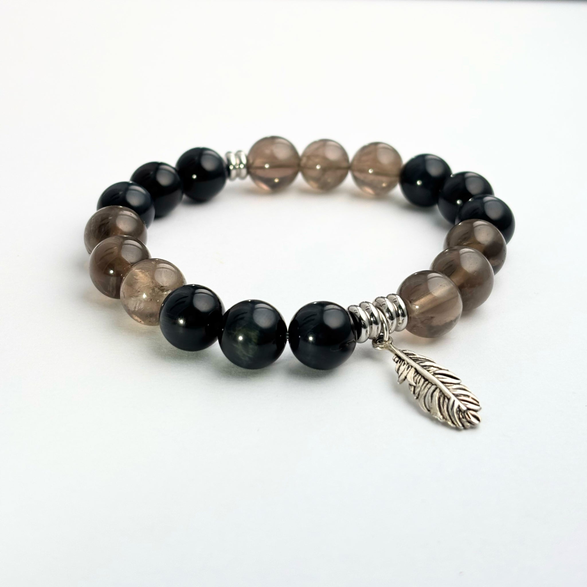 Hawk's Eye and Smoky Quartz Silver Feather feng shui bracelet for clarity and protection – IrisFengShui Main image
