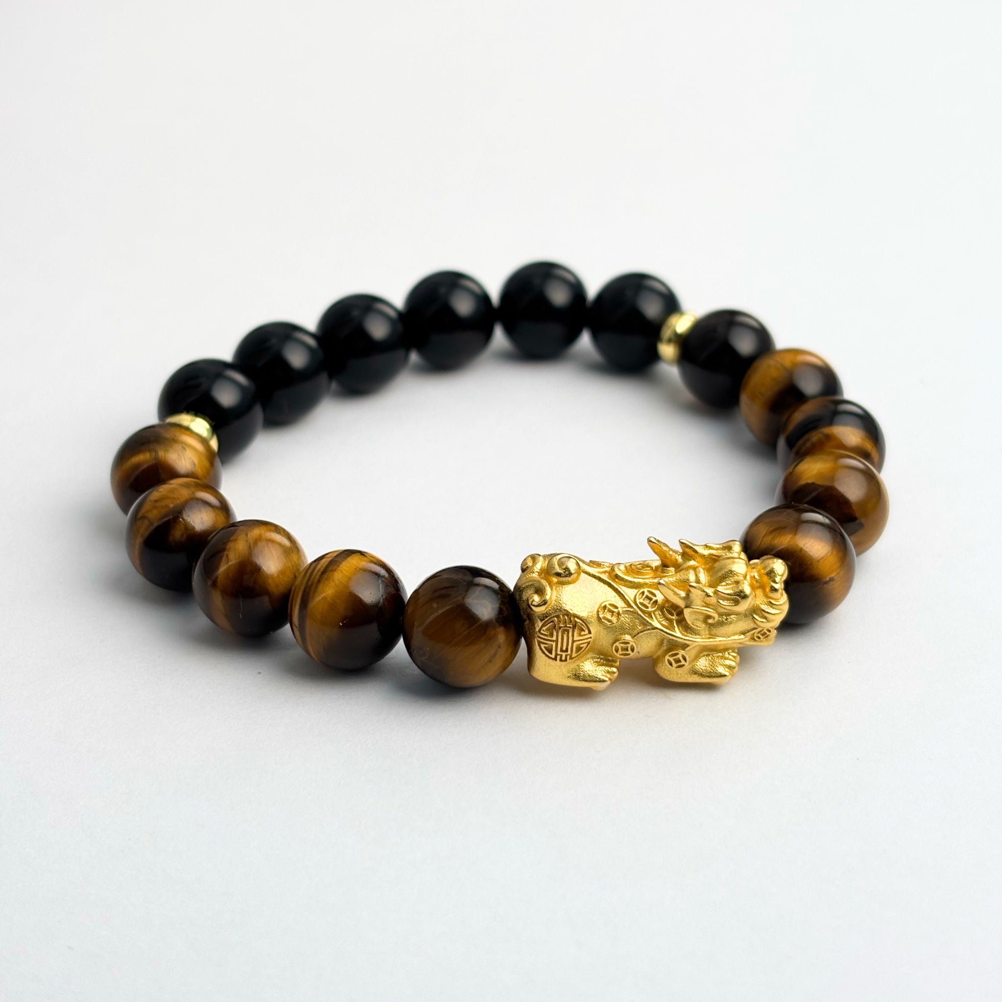 Pixiu Tiger Eye Black Obsidian feng shui bracelet for wealth and protection – IrisFengShui Main image