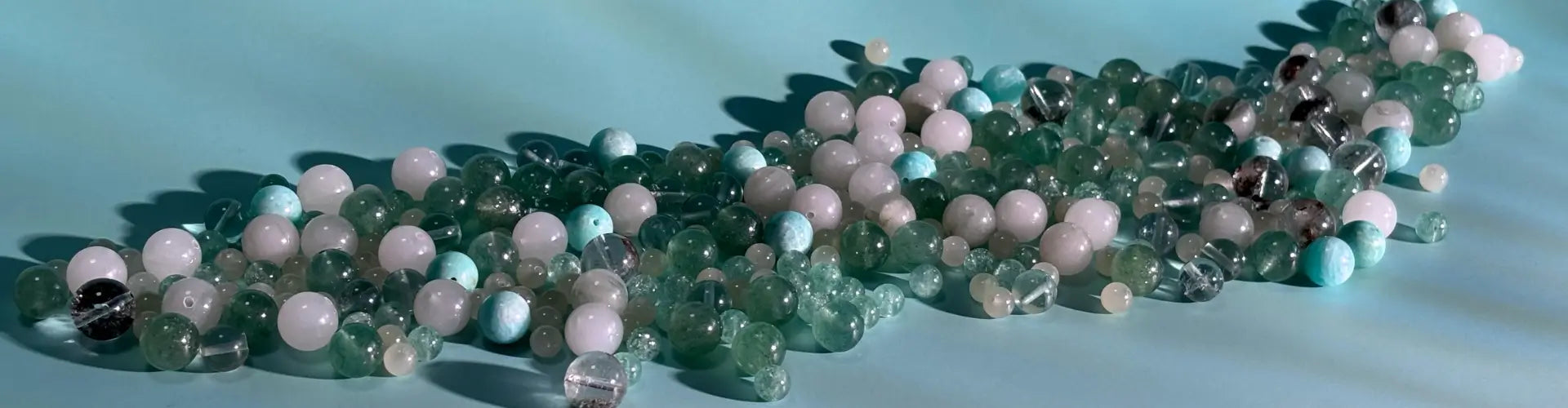 Wood element, Multicoloured beads on a light blue background